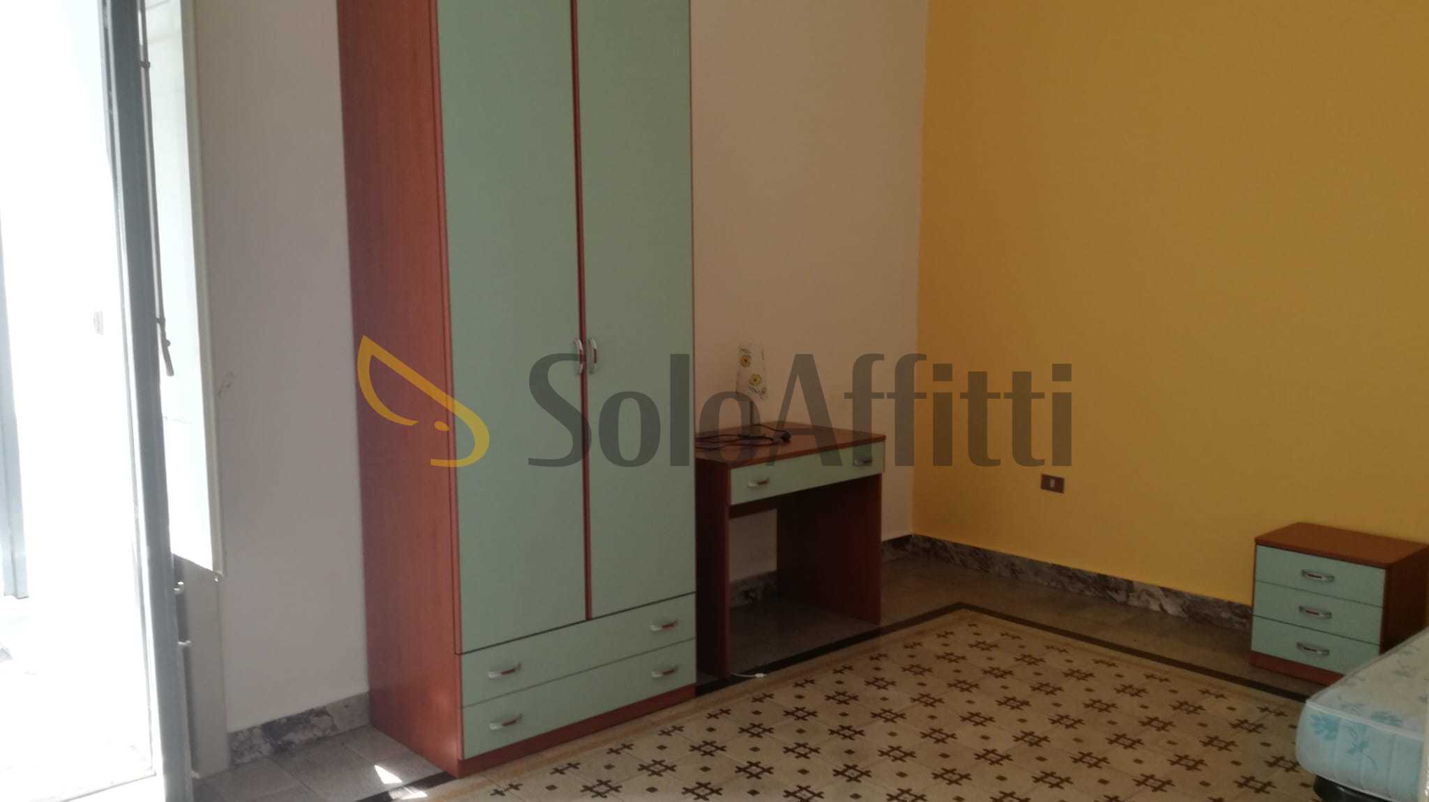 Immagine 8 di Stanza singola in affitto  a Catania