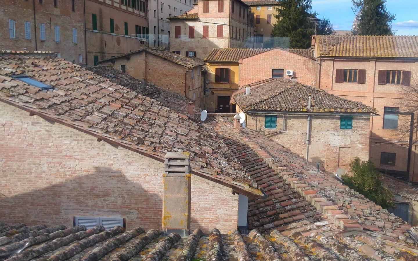 Immagine 20 di Appartamento in vendita  a Siena