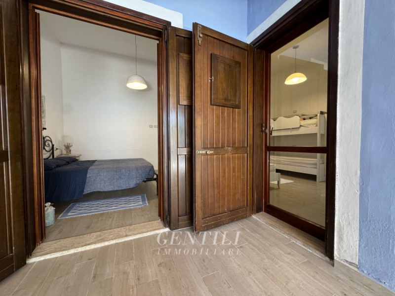 Immagine 14 di Villetta a schiera in vendita  a Arzachena