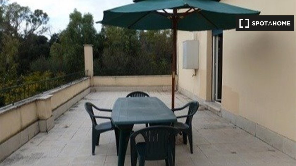 Immagine 3 di Camera condivisa in affitto  in Via Portuense a Roma