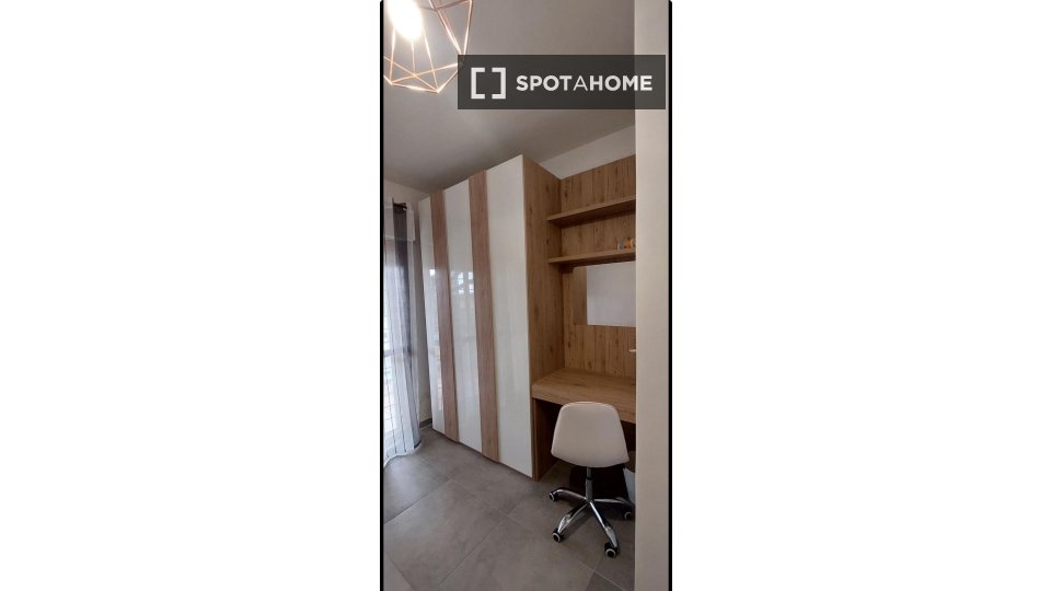 Immagine 2 di Camera condivisa in affitto  in Via di Torre Gaia a Roma