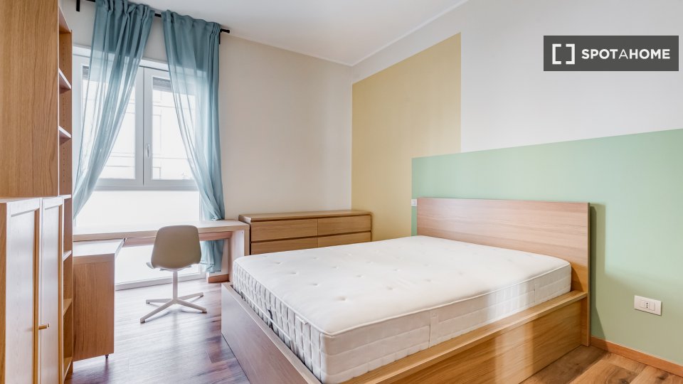 Immagine 19 di Camera condivisa in affitto  in Via Ostiense a Roma