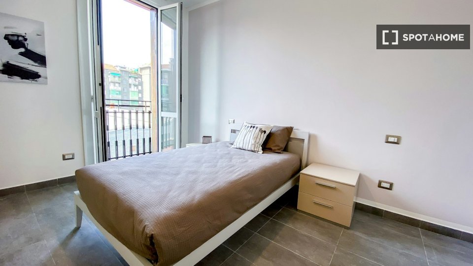 Immagine 2 di Camera condivisa in affitto  in Via Democrito a Milano