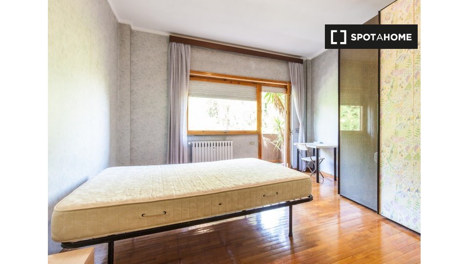 Immagine 16 di Camera condivisa in affitto  in Via Tiberio Imperatore, 00145 Roma RM, Italy a Roma