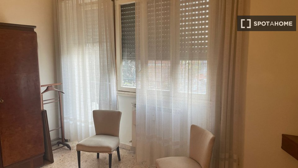 Immagine 19 di Camera condivisa in affitto  in Via Emilio de Marchi a Roma