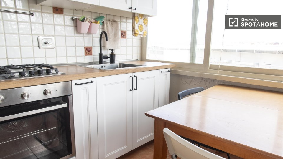 Immagine 13 di Camera condivisa in affitto  in Viale dello Scalo San Lorenzo a Roma