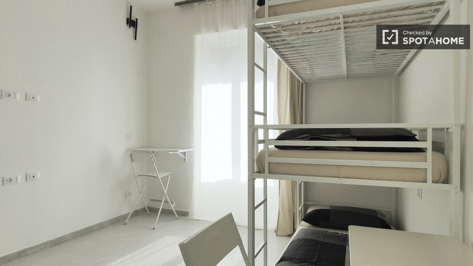 Immagine 1 di Camera condivisa in affitto  in Via Marco Ulpio Traiano a Milano